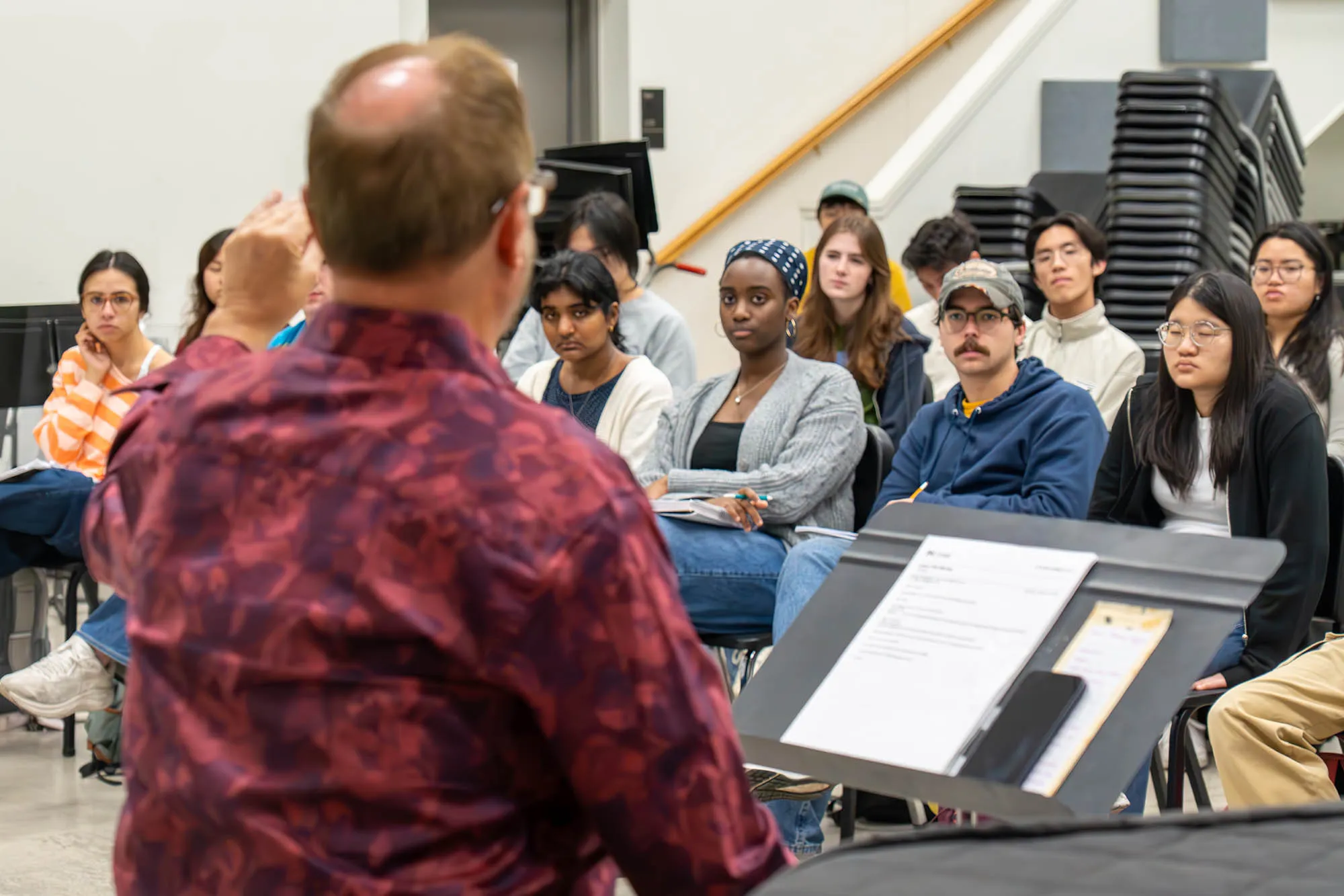 Students listen to a professor lecture