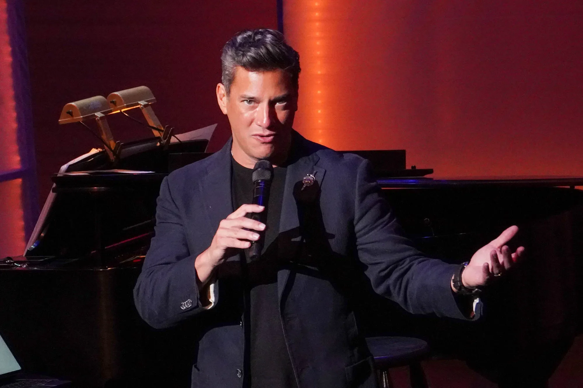 Nicholas Rodriguez singing on stage