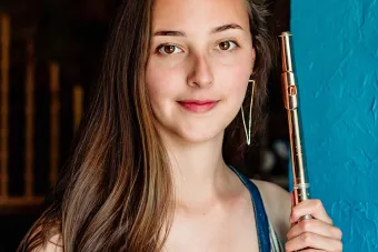 Indigo E. Fischer poses with instrument