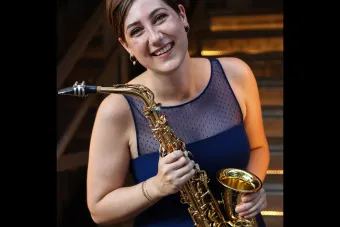 Sarah Hetrick poses with saxophone