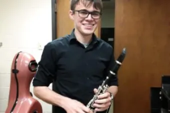 Thomas Rodriguez poses with clarinet