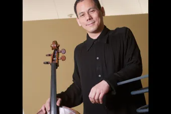 Bion Tsang poses with cello