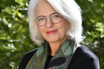 Laurie Scott looks confidently into camera