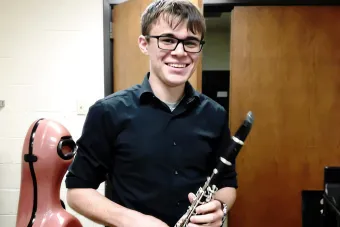 Thomas Rodiguez holds his clarinet