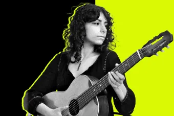 Amanda Pascali with her guitar.