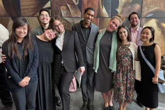 Group of students standing together with smiles