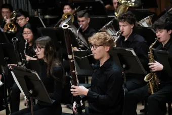 a Bassoonist performs during a Symphony Band concert