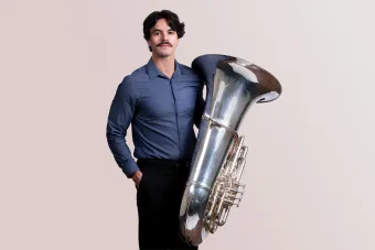 a student with his tuba