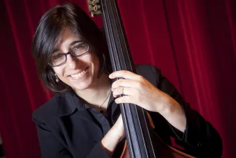 laura camacho holding a bass 