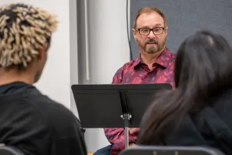 Jeffrey Jones-Ragona talking to a class 