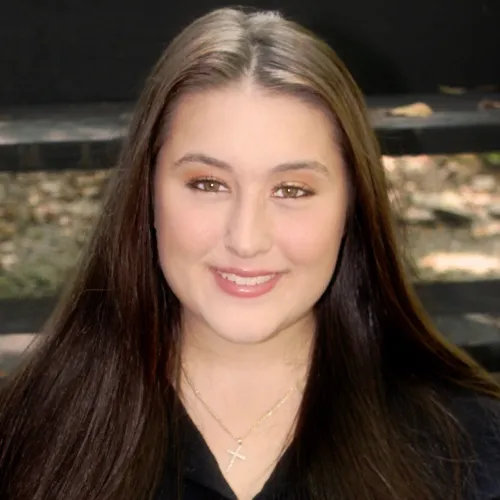 A headshot of Kayla Sutur