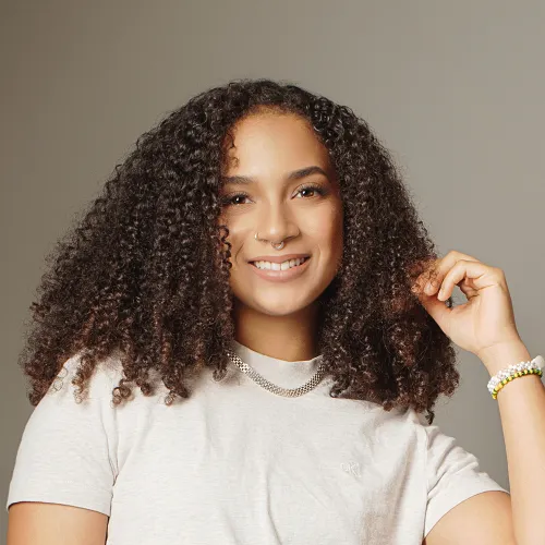 A headshot of Eli Mena