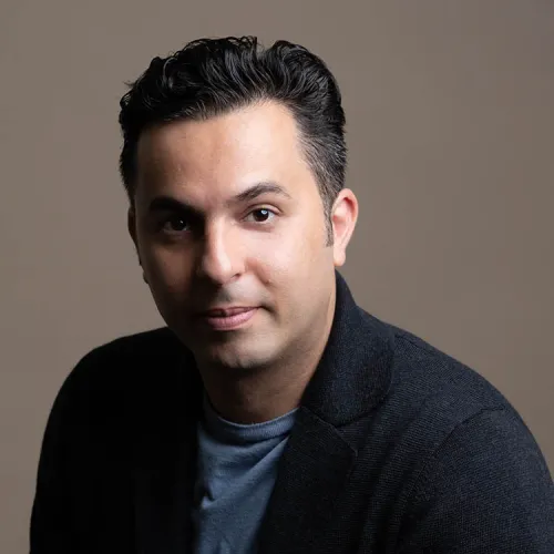 a headshot of Farkhad Khudyev.