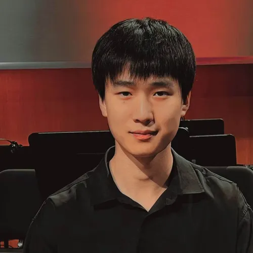 a headshot of Zhe Cao