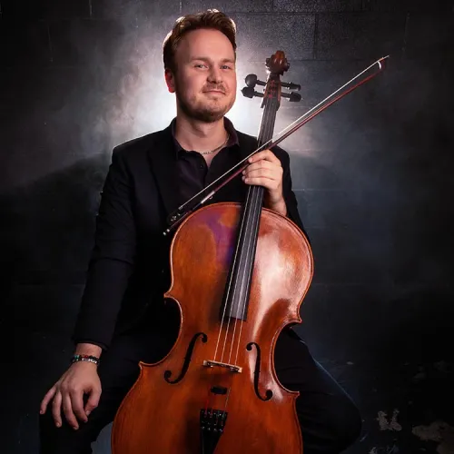 Aidan Bolding plays his cello during a performance