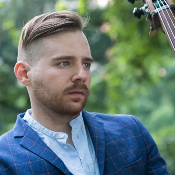 A headshot of Alex Claffy