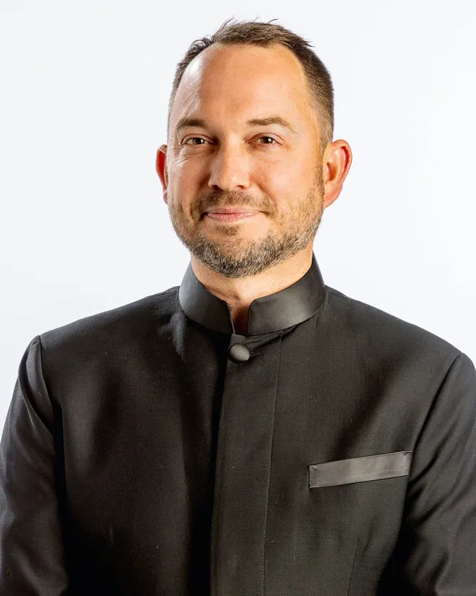 A headshot of Doug Henderson