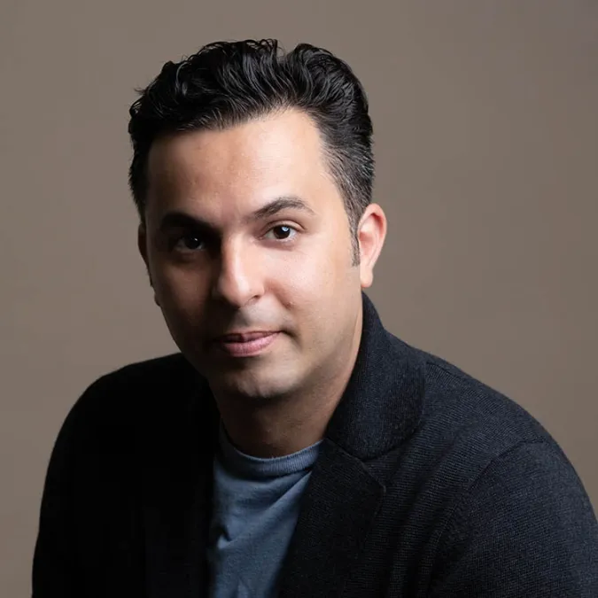 a headshot of Farkhad Khudyev.