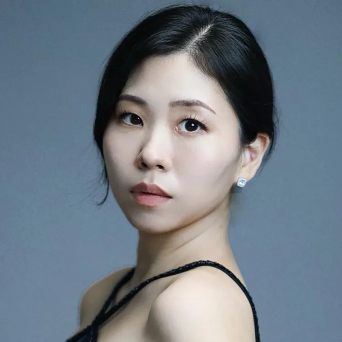 A headshot of Joohyun Kim