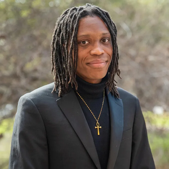 A headshot of Noah Hudson-Camack