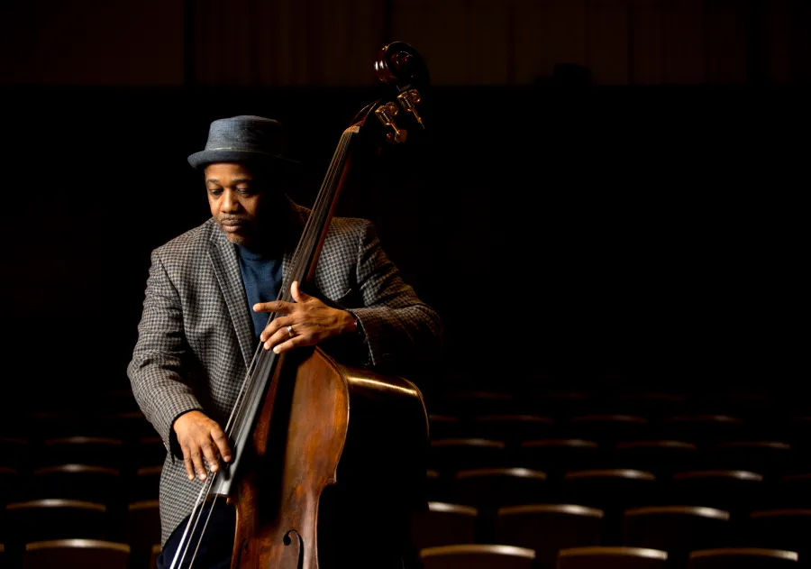 jazz bass player Rodney Whitaker plays his bass in an empty auditorium