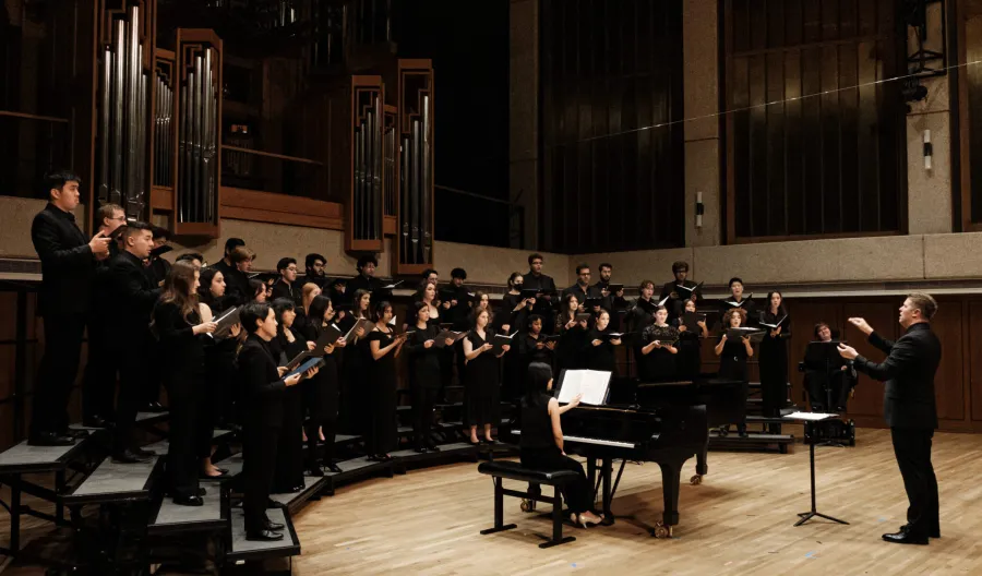 Concert Chorale performs on Bates Recital Hall stage.