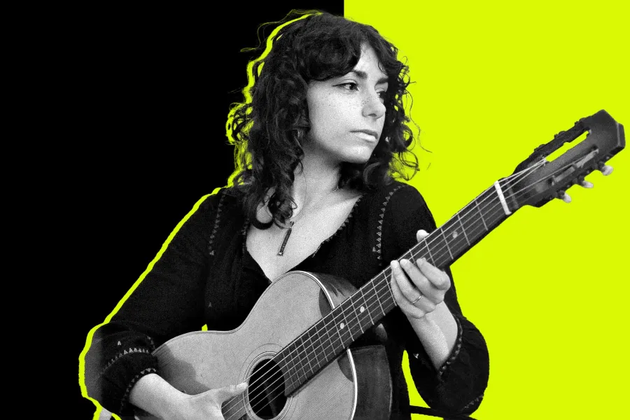 Amanda Pascali with her guitar.