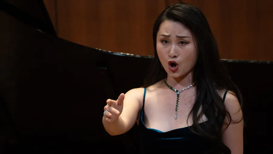 Opera Singer singing on stage at the Butler Opera International Competition
