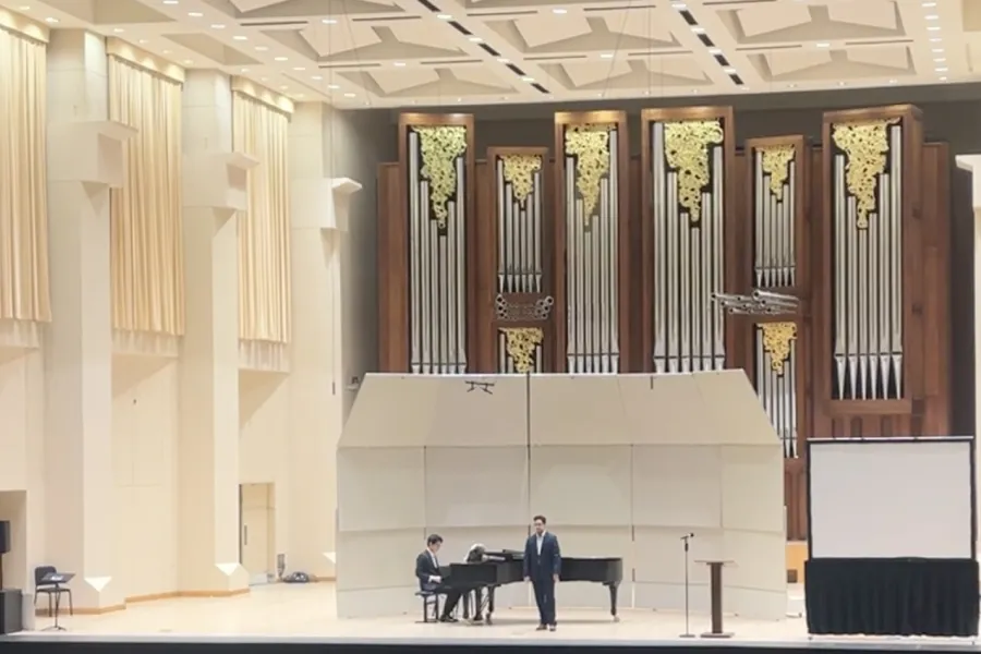 Nathaniel Payan Singing on Stage