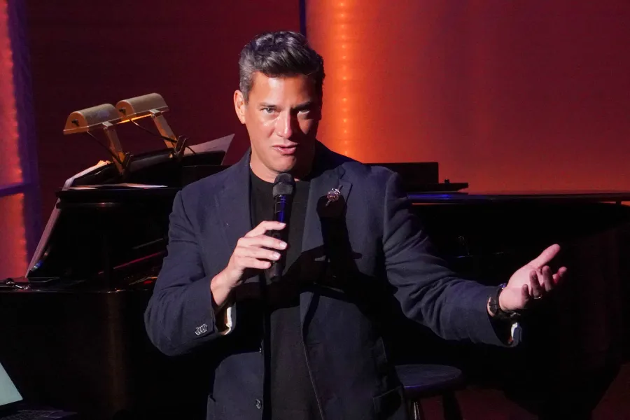 Nicholas Rodriguez singing on stage