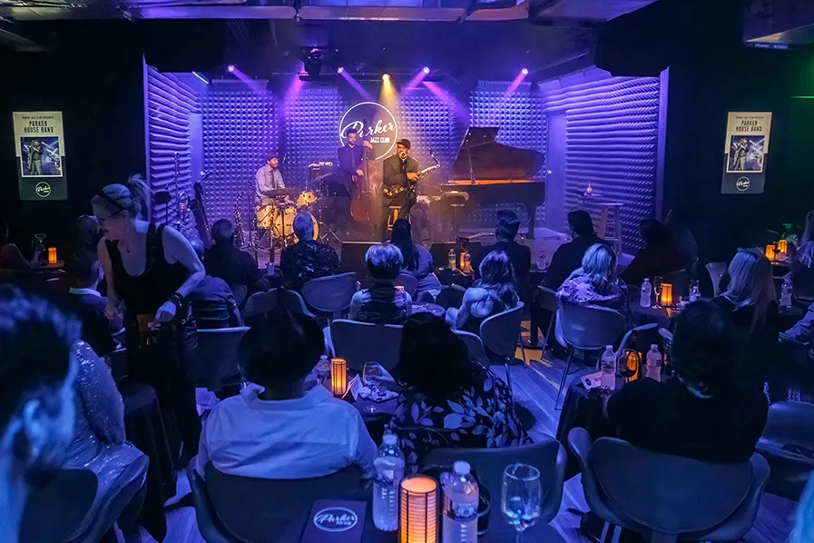 A Jazz Band Performs in a crowded club