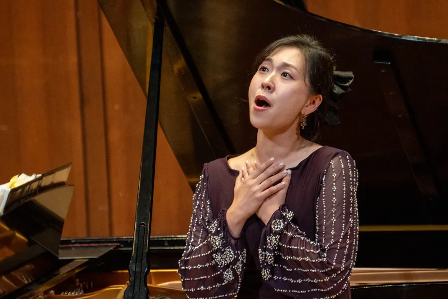Opera Singer singing on stage at the Butler Opera International Competition