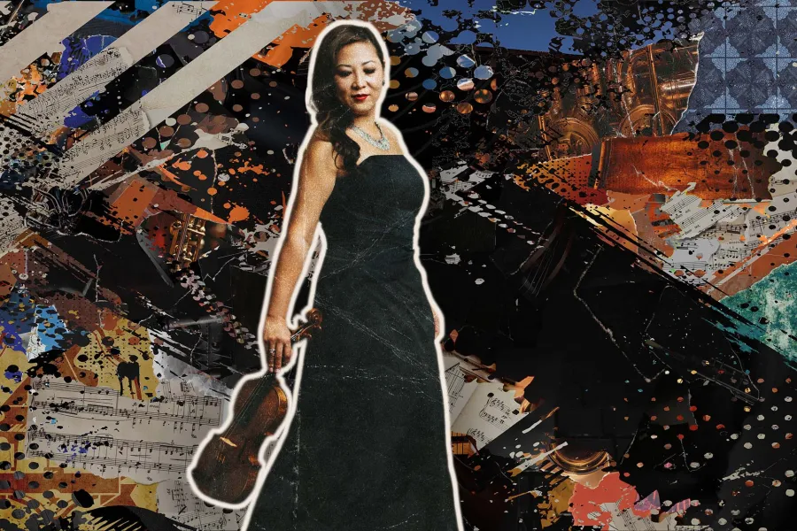 A headshot of Sandy Yamamoto looking down at her violin